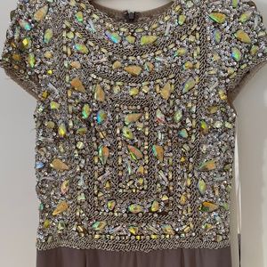 Long dress with appliqués jewel top